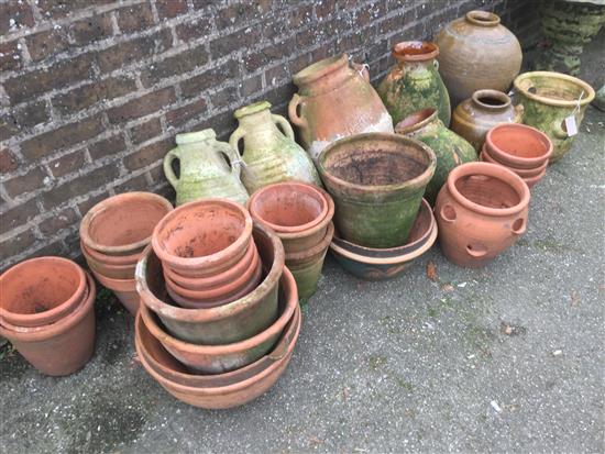 Collection of terracotta amphora and flower pots